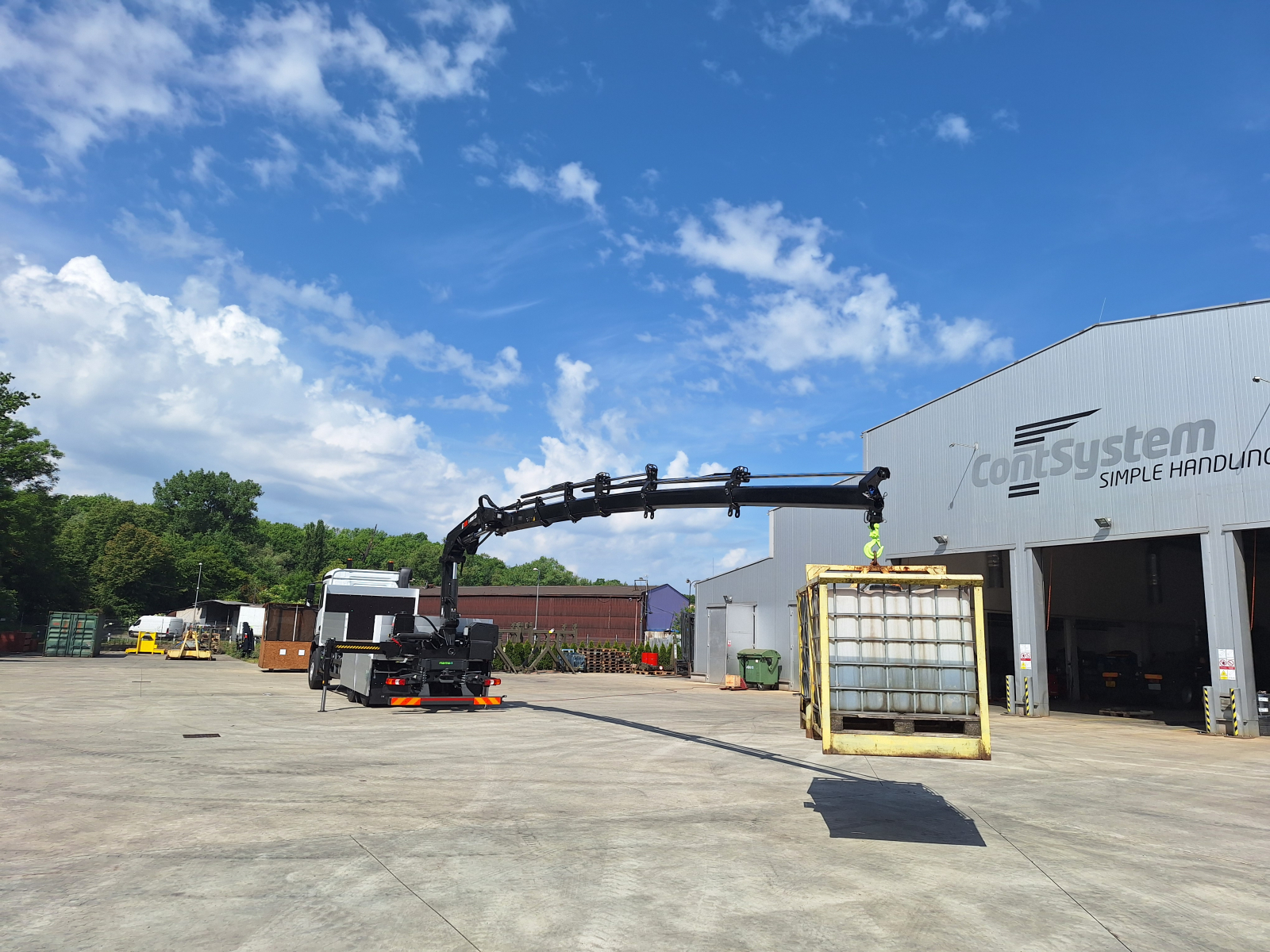 HIAB X-HIDUO 228 E-5 hydraulic loader crane for handling roofing material